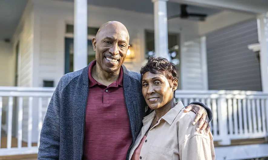 couple happily protected by renters insurance AARP