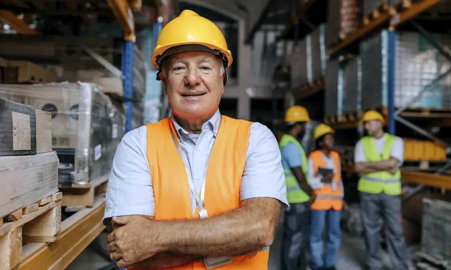 male small business owner protected by safety consultant insurance