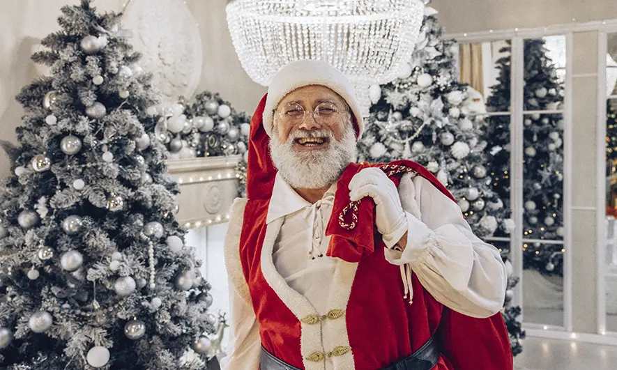 business owner happy to do his job after getting a santa insurance quote
