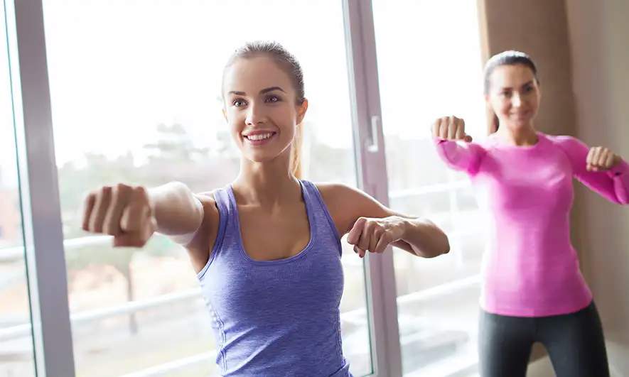 small business owner is pleased after getting a self defense liability insurance quote