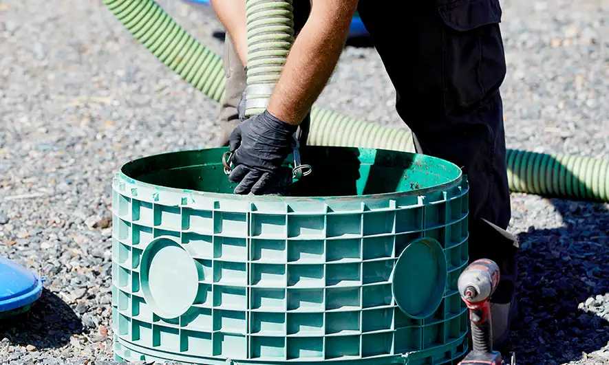 business owner happy to do his job after getting a septic system insurance quote