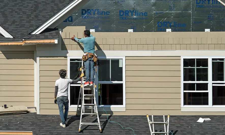 small business owners protected by siding contractor insurance
