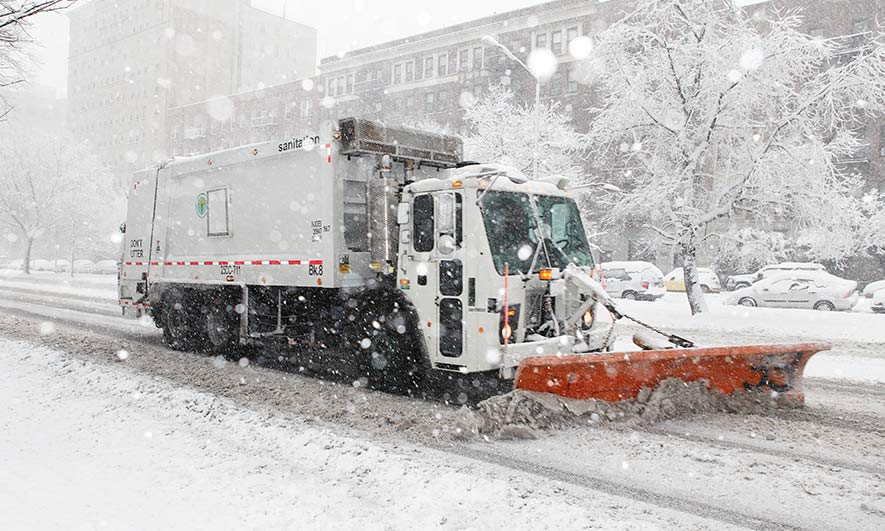 small business protected by snow plow insurance coverage