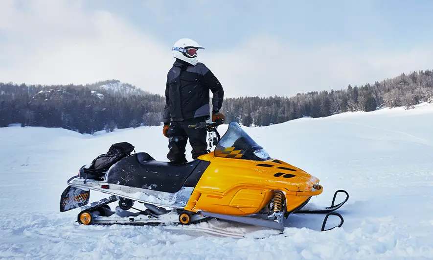 customer protected by snowmobile insurance coverage