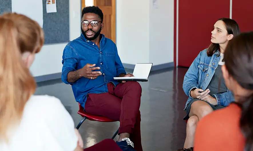 business owner happy to do his job after getting a social work professional liability insurance quote