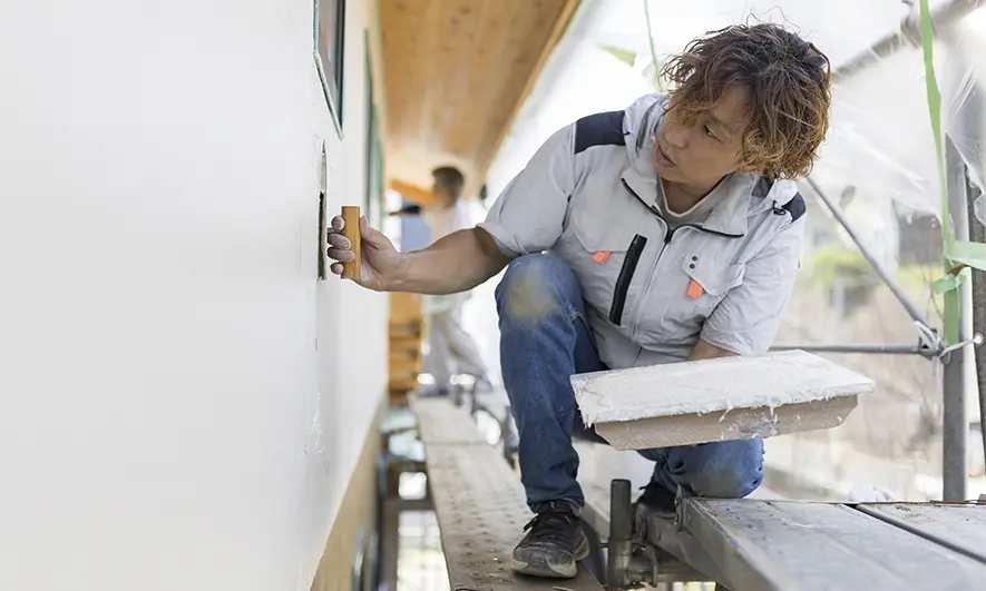 small business owner protected by stucco contractor insurance