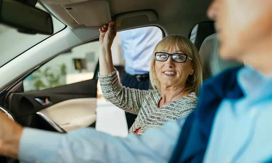couple protected by uninsured underinsured motorist property damage insurance from The Hartford