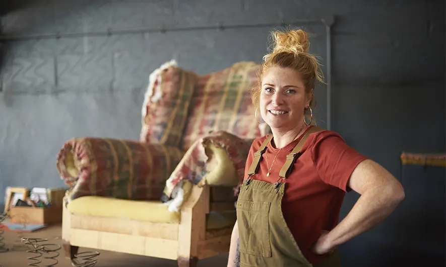 female business owners happily works after getting upholsterers insurance quote