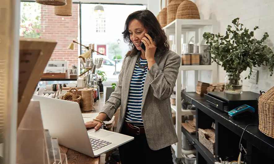 small business owner enjoying their job understanding what is workman's comp insurance