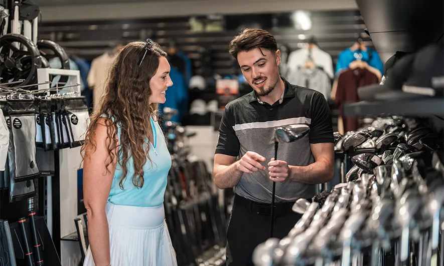 female and male small business owners know who may need sporting goods store insurance