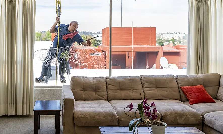 small business owner protected by window cleaning liability insurance