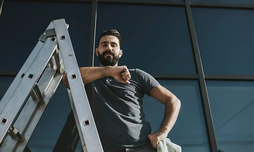 small business owner protected by window washing insurance
