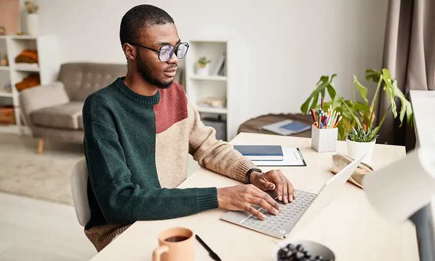 male small business employee covered by workers comp working from home