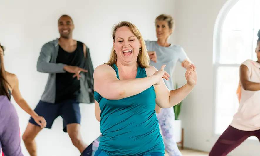 business owners happily protected by zumba teacher insurance
