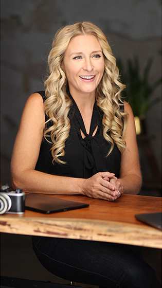 small business owner giving testimonial on having photography insurance from The Hartford