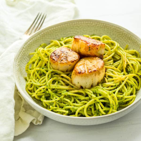 Seared Scallops Over Spinach Pesto and Pasta