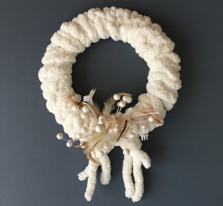 Wreath made of soft white yarn